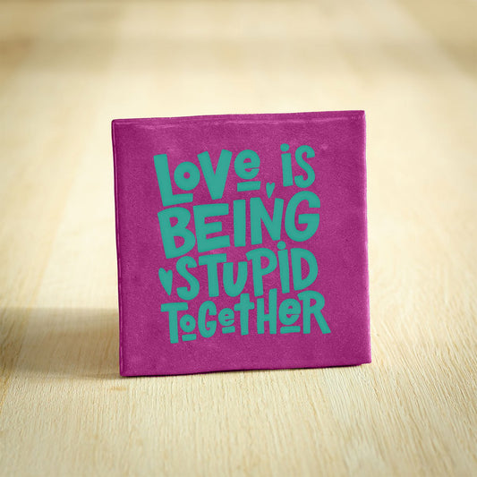 Tegeltje - Love is being stupid together